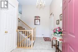 Foyer and access to upper and lower levels - 