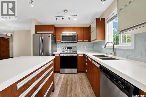 102 110 Phelps Way, Saskatoon, SK - Indoor Photo Showing Kitchen With Stainless Steel Kitchen With Double Sink