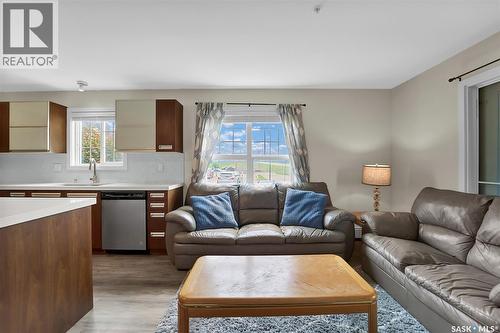 102 110 Phelps Way, Saskatoon, SK - Indoor Photo Showing Living Room