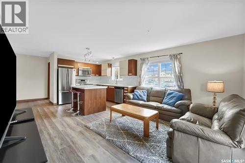 102 110 Phelps Way, Saskatoon, SK - Indoor Photo Showing Living Room