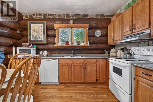 1011 Orange Lodge Road, Muskoka Lakes (Medora), ON - Indoor Photo Showing Kitchen With Double Sink