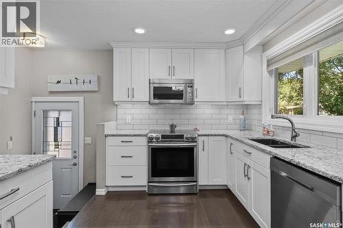 1561 Sibbald Crescent, Prince Albert, SK - Indoor Photo Showing Kitchen With Double Sink With Upgraded Kitchen