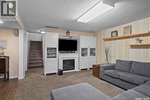 1561 Sibbald Crescent, Prince Albert, SK - Indoor Photo Showing Living Room With Fireplace