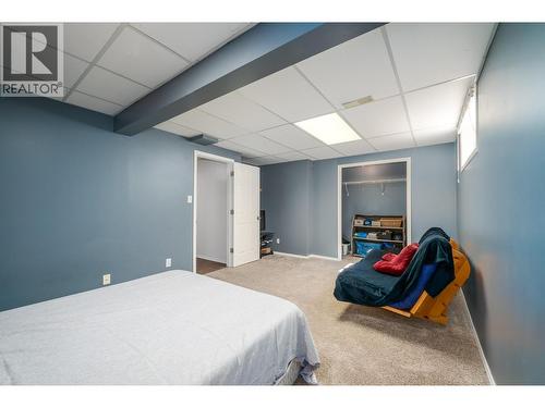 110 Wyndham Crescent, Kelowna, BC - Indoor Photo Showing Bedroom