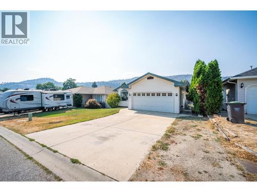 110 Wyndham Crescent, Kelowna, BC - Outdoor With Facade