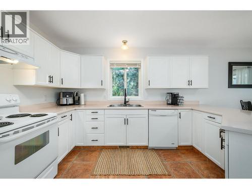 110 Wyndham Crescent, Kelowna, BC - Indoor Photo Showing Kitchen With Double Sink