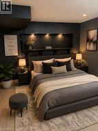 Recessed lighting over a built-in shelf, wood-finish flooring, and dark-painted walls - 