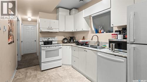 110 S Avenue S, Saskatoon, SK - Indoor Photo Showing Kitchen With Double Sink