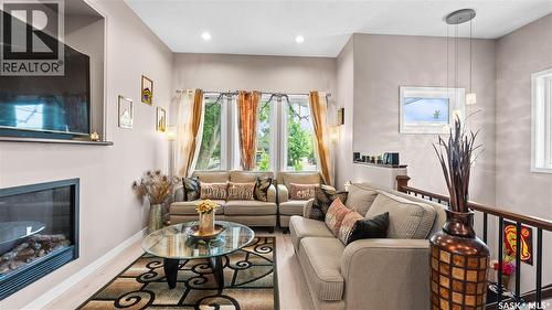 110 S Avenue S, Saskatoon, SK - Indoor Photo Showing Living Room With Fireplace