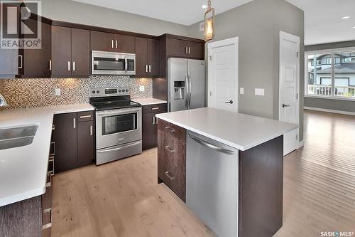 524 Maple Crescent, Warman, SK - Indoor Photo Showing Kitchen With Double Sink With Upgraded Kitchen