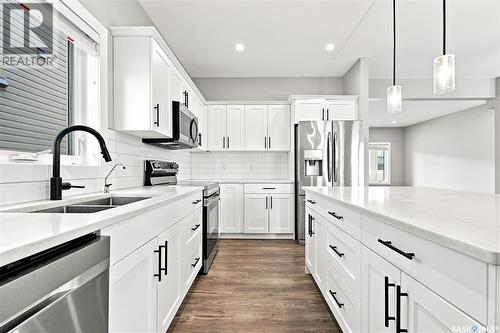 247 Thakur Street, Saskatoon, SK - Indoor Photo Showing Kitchen With Double Sink With Upgraded Kitchen