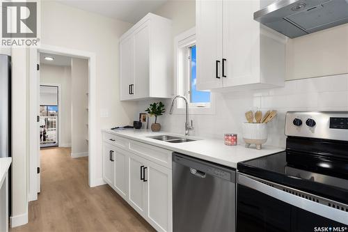 595 Cockcroft Court, Saskatoon, SK - Indoor Photo Showing Kitchen With Double Sink