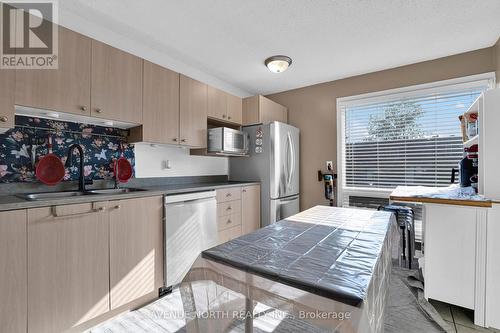 41 - 3520 Downpatrick Road, Ottawa, ON - Indoor Photo Showing Kitchen With Double Sink