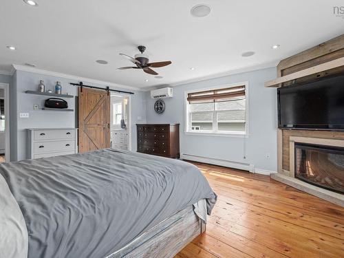 37 Pearl Drive, Colby, NS - Indoor Photo Showing Bedroom With Fireplace