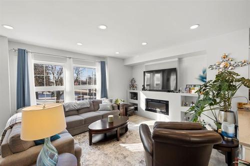 210 Main Street, Selkirk, MB - Indoor Photo Showing Living Room With Fireplace