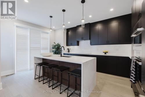 Photo provided to showcase builders finishes only. - 3025 Weecay Circle, Ottawa, ON - Indoor Photo Showing Kitchen With Upgraded Kitchen