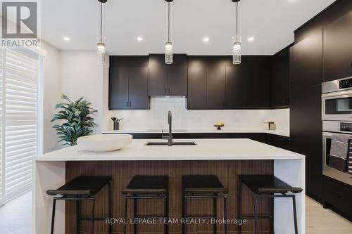 Photo provided to showcase builders finishes only. - 3025 Weecay Circle, Ottawa, ON - Indoor Photo Showing Kitchen With Upgraded Kitchen