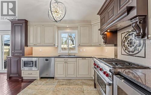 Kitchen with Ceramic Tiles - 1665 Asgard Drive, Mississauga, ON - Indoor Photo Showing Kitchen With Double Sink With Upgraded Kitchen