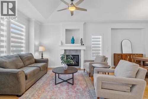 1285 Tanemura Crescent, Kelowna, BC - Indoor Photo Showing Living Room With Fireplace