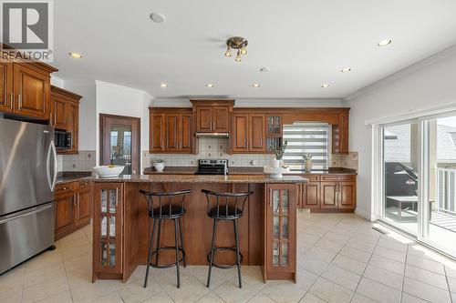1285 Tanemura Crescent, Kelowna, BC - Indoor Photo Showing Kitchen With Double Sink