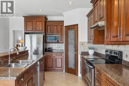 1285 Tanemura Crescent, Kelowna, BC - Indoor Photo Showing Kitchen With Double Sink