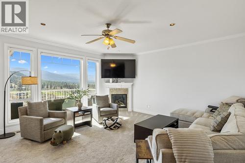 1285 Tanemura Crescent, Kelowna, BC - Indoor Photo Showing Living Room With Fireplace