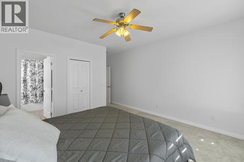 1285 Tanemura Crescent, Kelowna, BC - Indoor Photo Showing Bedroom
