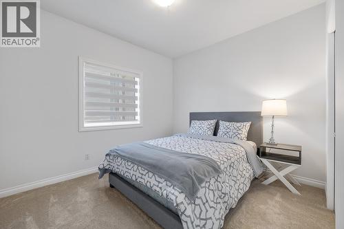 1285 Tanemura Crescent, Kelowna, BC - Indoor Photo Showing Bedroom