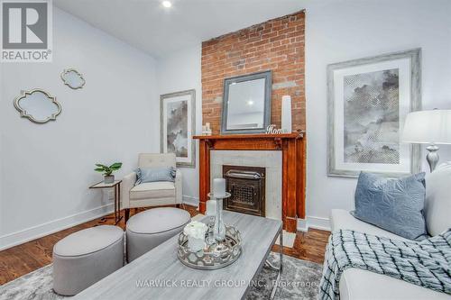 Lower - 57 Bertmount Avenue, Toronto, ON - Indoor Photo Showing Living Room With Fireplace