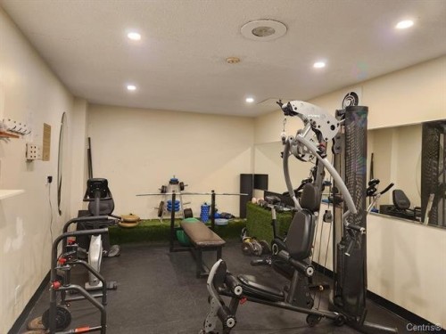 Exercise Room - 1125-2555 Av. Du Havre-Des-Îles, Laval (Chomedey), QC - Indoor Photo Showing Gym Room