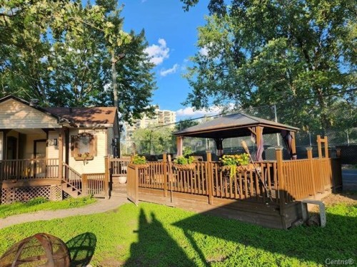 Pool - 1125-2555 Av. Du Havre-Des-Îles, Laval (Chomedey), QC - Outdoor With Deck Patio Veranda With Backyard