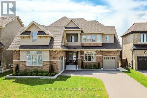 108 Rugman Crescent, Springwater, ON - Outdoor With Facade