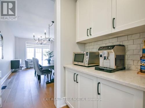 108 Rugman Crescent, Springwater, ON - Indoor Photo Showing Kitchen
