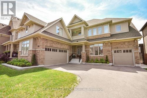 108 Rugman Crescent, Springwater, ON - Outdoor With Facade
