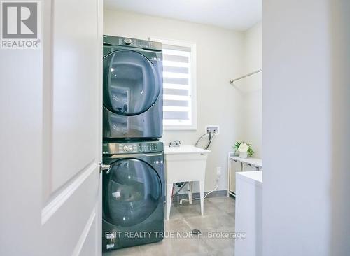 108 Rugman Crescent, Springwater, ON - Indoor Photo Showing Laundry Room