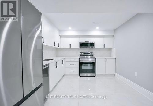 108 Rugman Crescent, Springwater, ON - Indoor Photo Showing Kitchen