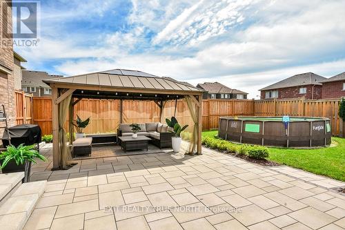 108 Rugman Crescent, Springwater, ON - Outdoor With Above Ground Pool