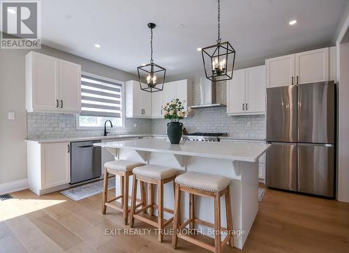 108 Rugman Crescent, Springwater, ON - Indoor Photo Showing Kitchen With Upgraded Kitchen