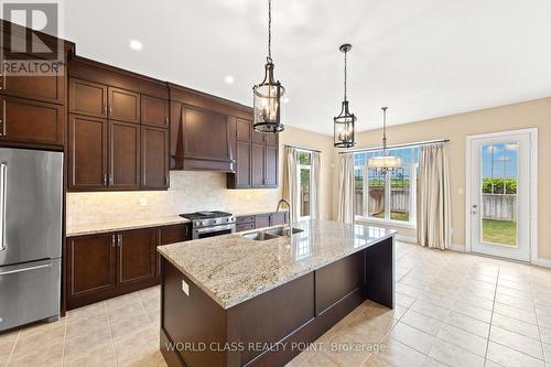 31 Munsie Drive, King, ON - Indoor Photo Showing Kitchen With Double Sink With Upgraded Kitchen