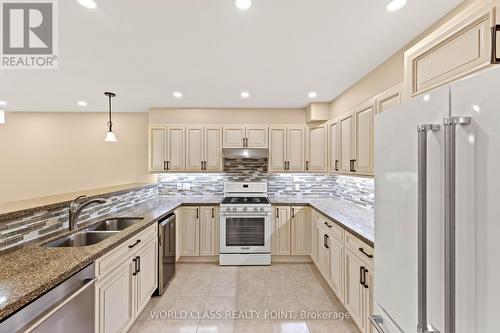 31 Munsie Drive, King, ON - Indoor Photo Showing Kitchen With Double Sink With Upgraded Kitchen