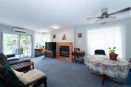 #203A-3000 Oak St, Chemainus, BC - Indoor Photo Showing Living Room With Fireplace