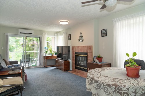 #203A-3000 Oak St, Chemainus, BC - Indoor Photo Showing Living Room With Fireplace