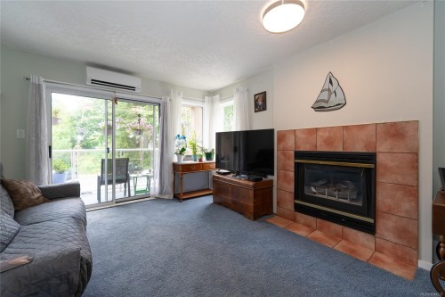 #203A-3000 Oak St, Chemainus, BC - Indoor Photo Showing Living Room With Fireplace