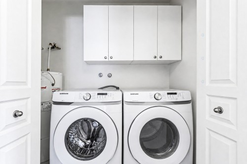 Salle de lavage - 205-100 Rue Barnett, Dollard-Des-Ormeaux, QC - Indoor Photo Showing Laundry Room