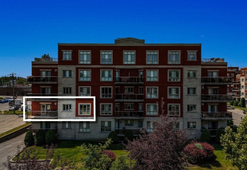 Façade - 205-100 Rue Barnett, Dollard-Des-Ormeaux, QC - Outdoor With Balcony With Facade