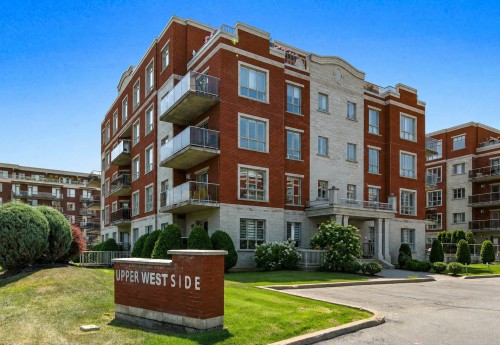 Façade - 205-100 Rue Barnett, Dollard-Des-Ormeaux, QC - Outdoor With Balcony With Facade