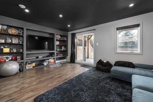 Salle de jeux - 200 Rue Des Hirondelles, Saint-Eustache, QC - Indoor Photo Showing Living Room