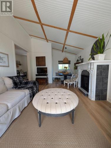 28- 79681 Bluewater Highway, Central Huron (Goderich), ON - Indoor Photo Showing Living Room With Fireplace