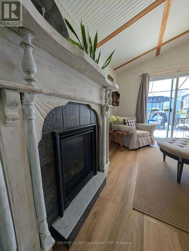 28- 79681 Bluewater Highway, Central Huron (Goderich), ON - Indoor Photo Showing Living Room With Fireplace