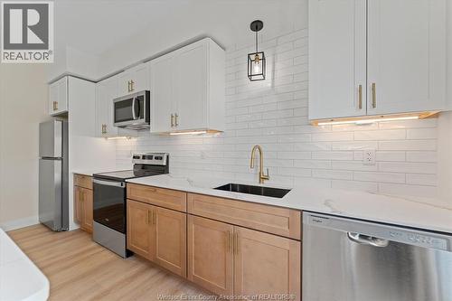 150 Old Front Unit# Front-Upper, Lasalle, ON - Indoor Photo Showing Kitchen With Stainless Steel Kitchen With Upgraded Kitchen